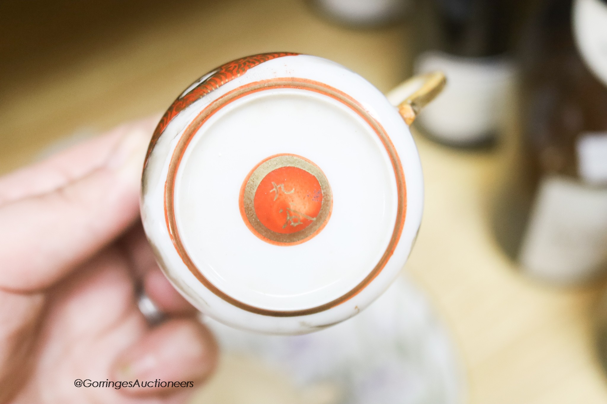 A group of various Japanese Meiji period cup and saucers